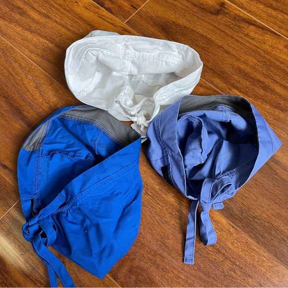 Like new Jaanuu scrub caps: white, royal blue & that hospital periwinkle color - Picture 2 of 3